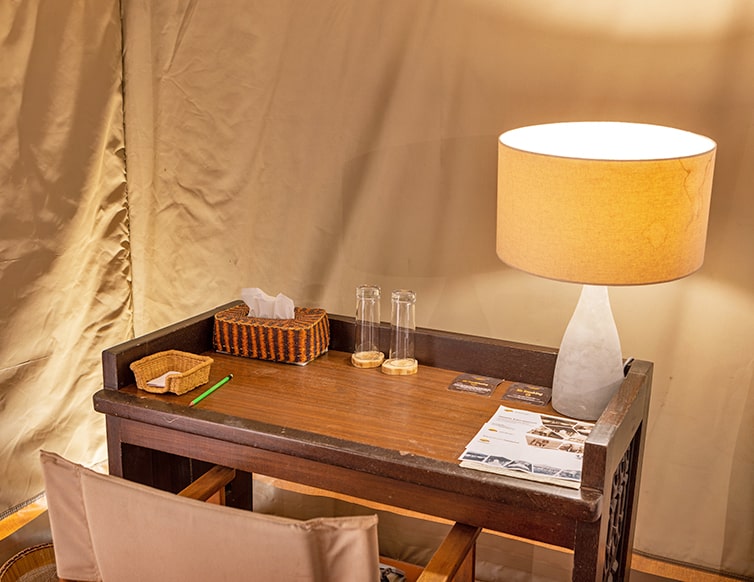 Image of the desk and office supplies at the chalets in Zaina Lodge, Mole National Park, Ghana