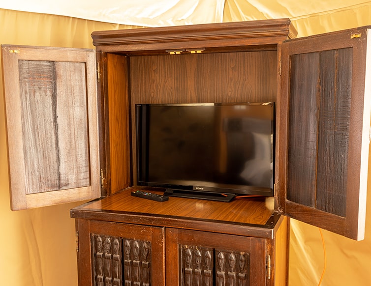 Image of the television cabinet in the chalets at Zaina Lodge, Mole National Park, Ghana