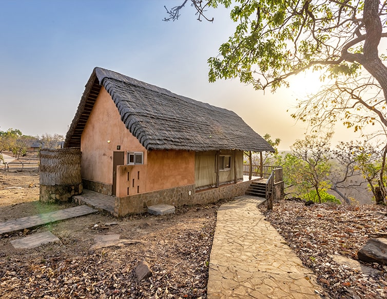 Image of a chalet at sunset in Zaina Lodge, Mole National Park, Ghana
